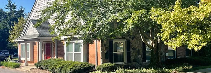 Chiropractic Livonia MI Correct Care Family Chiropractic Office Contact Us A side view of the clinic. It has a giant tree out front.