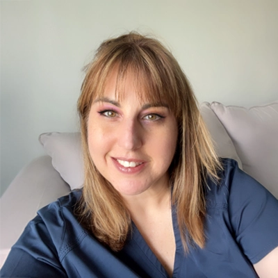 Chiropractic assistant, Jessica, smiling.