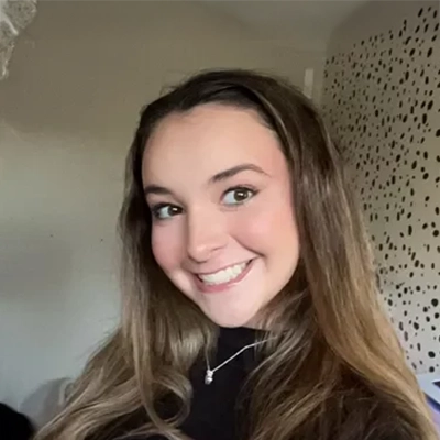 Joslyn smiling in a black shirt.